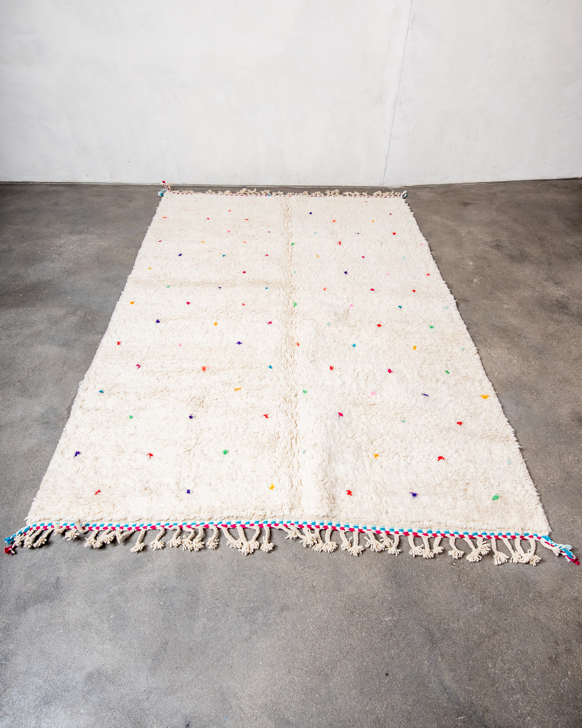 Modern, designer, handcrafted Berber rug from Morocco. Beniourain carpet with beautiful colours and patterns and fluffy wool texture.